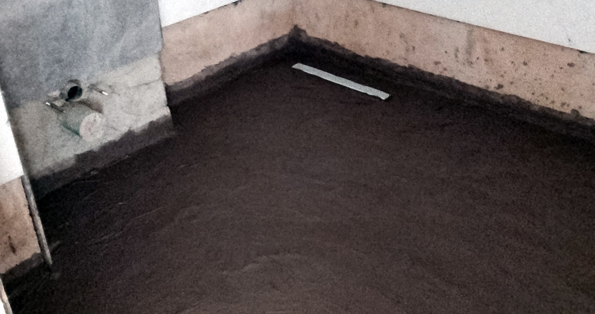Cementitious waterproofing membrane treatment for toilets and wet areas before tiling at Space and Scape Limited, Oniru Estate, Victoria Island, Lagos